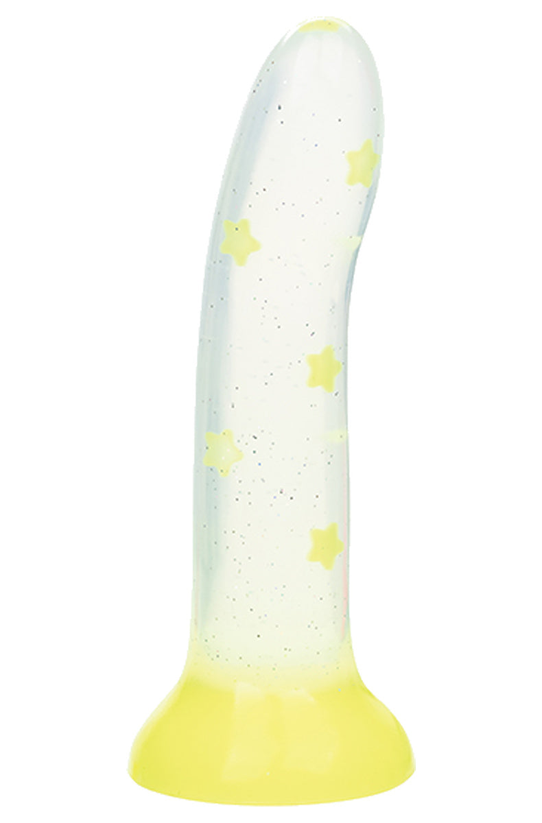 Clear sparkly dildo with yellow glow in the dark stars standing on its neon yellow suction cup
