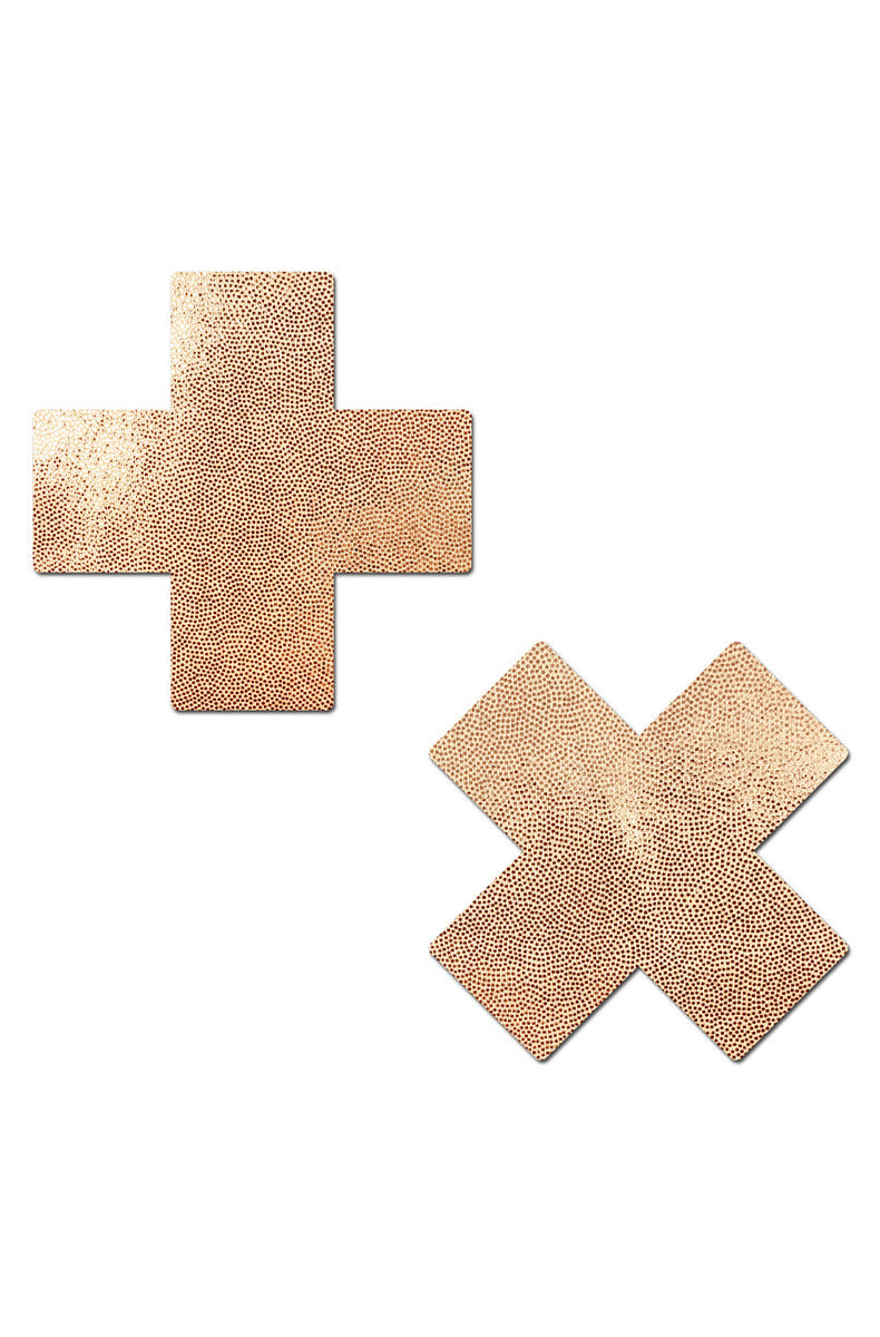 Pair of rose gold suede cross nipple covers with a metallic shimmer