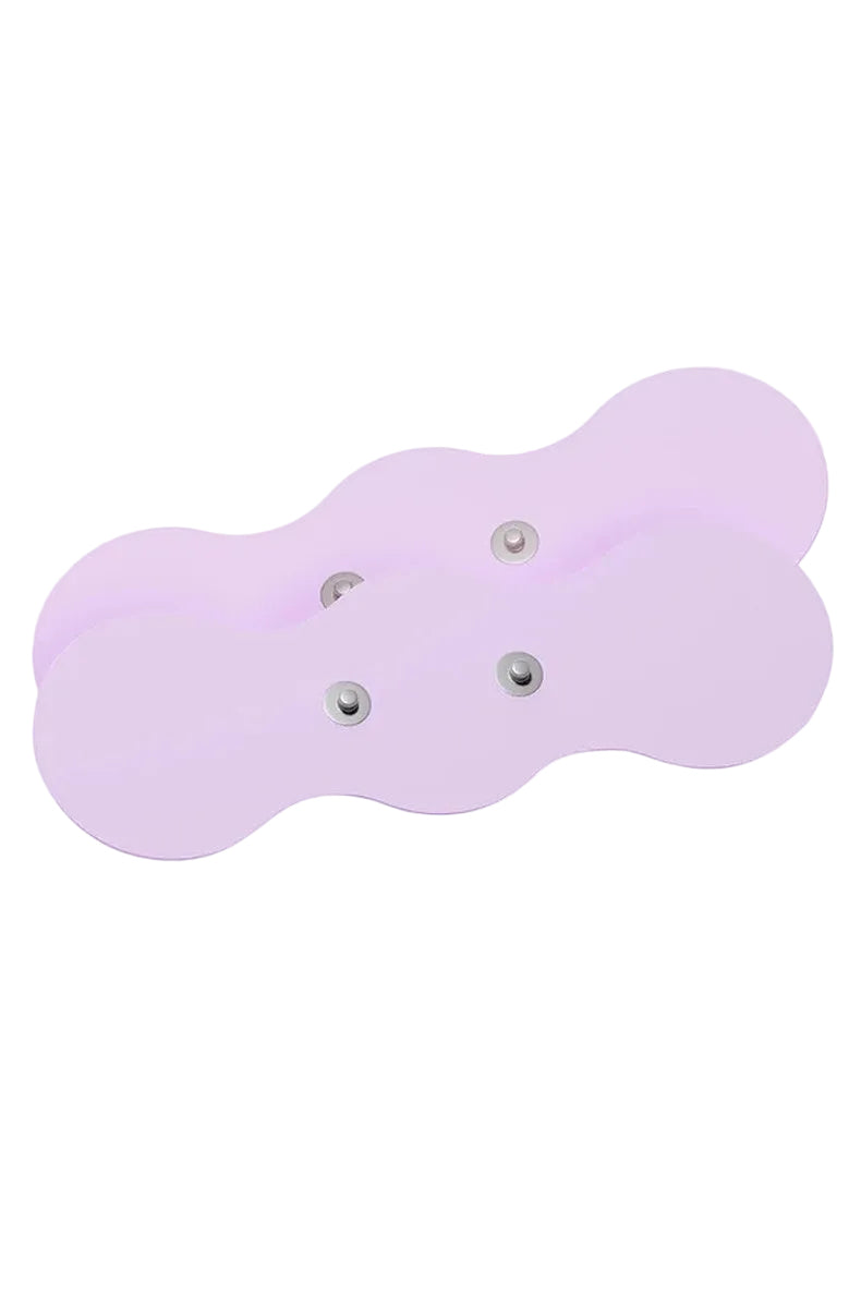 Two lilac VUSH Aura replacement gel pads with metal snap studs, shown stacked.