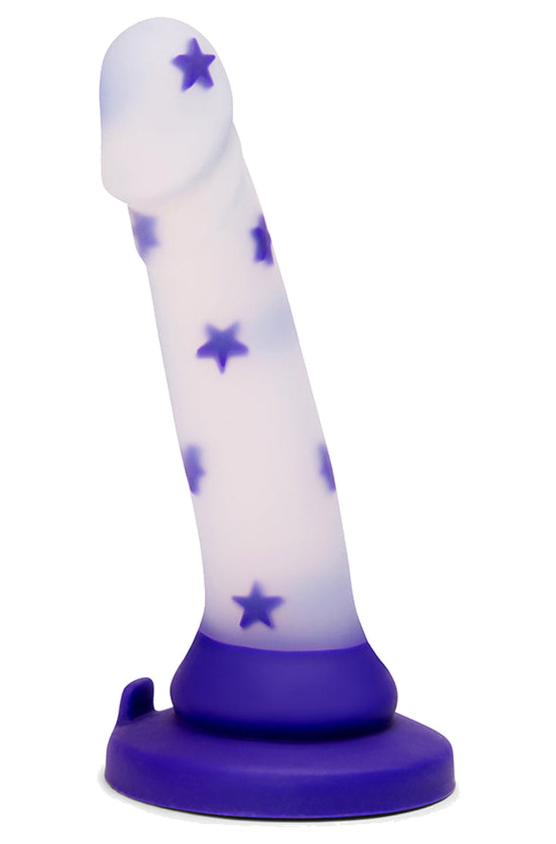 Clear silicone dildo with purple stars, side view showing the gentle curve