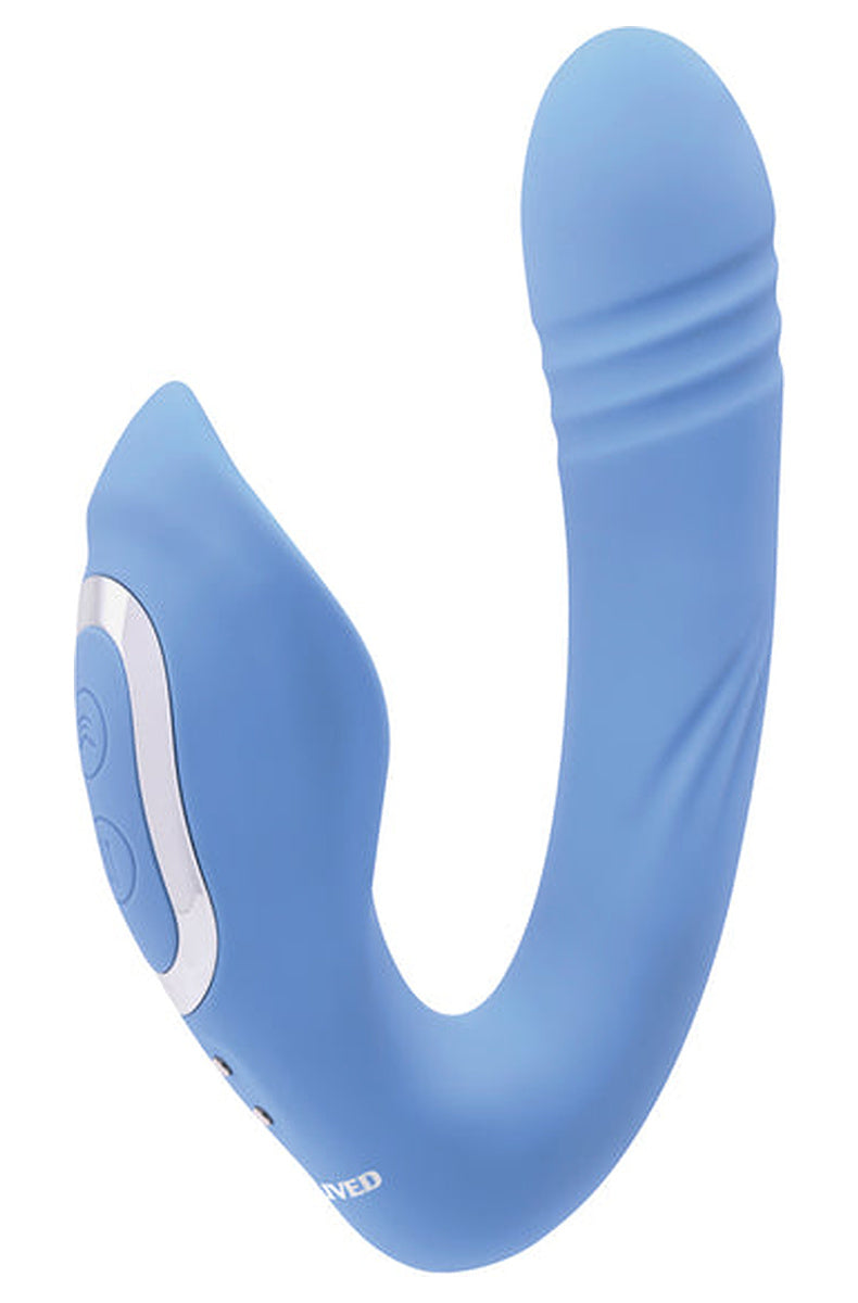 Side view of the blue Tap and Thrust vibrator, showing the flexible elbow between the internal and external arms.