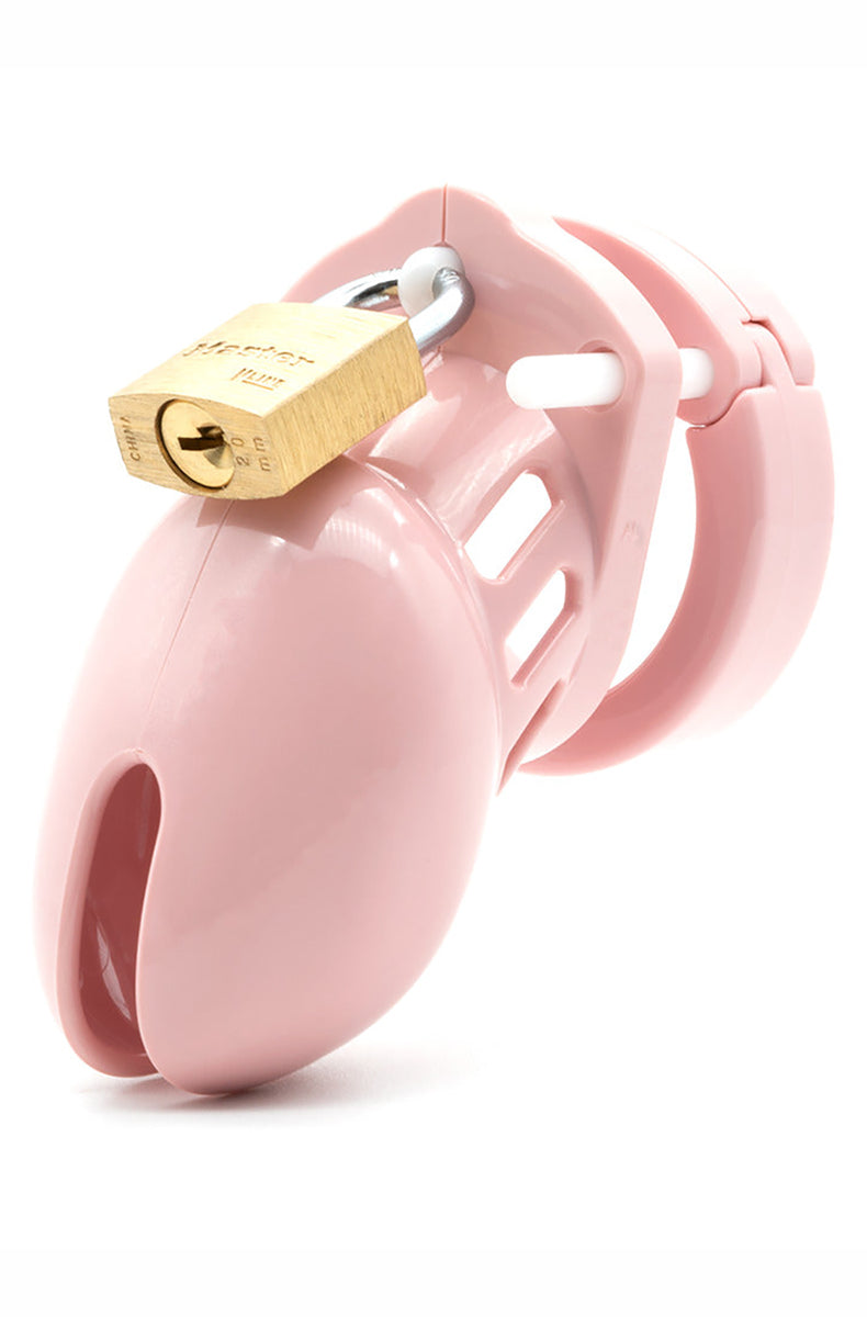 Pink CB-6000S chastity cage with a brass padlock, ventilated cage and flat ring, profile view on white background.