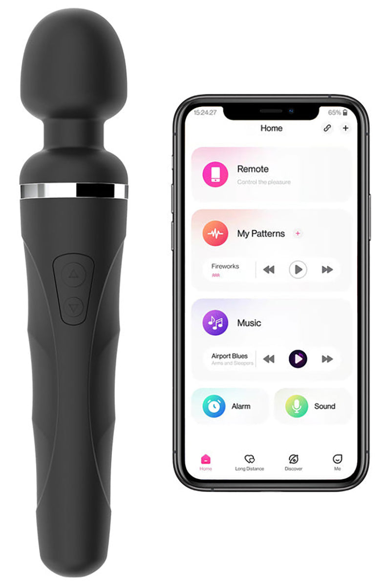 Lovense Domi 2 black silicone mini wand vibrator shown next to a smartphone displaying the Lovense Remote app interface.