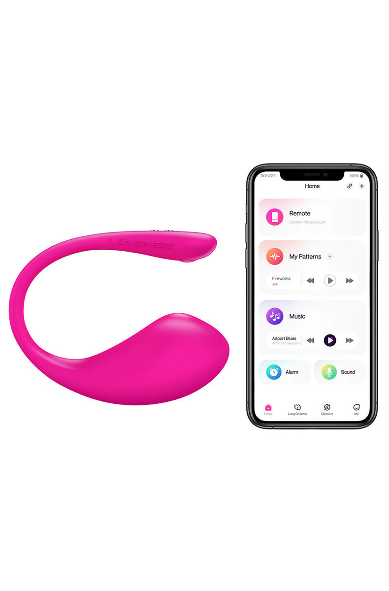 Lovense Lush 3 hot pink silicone wearable egg vibrator with curved tail, next to a phone showing the Lovense Remote app.