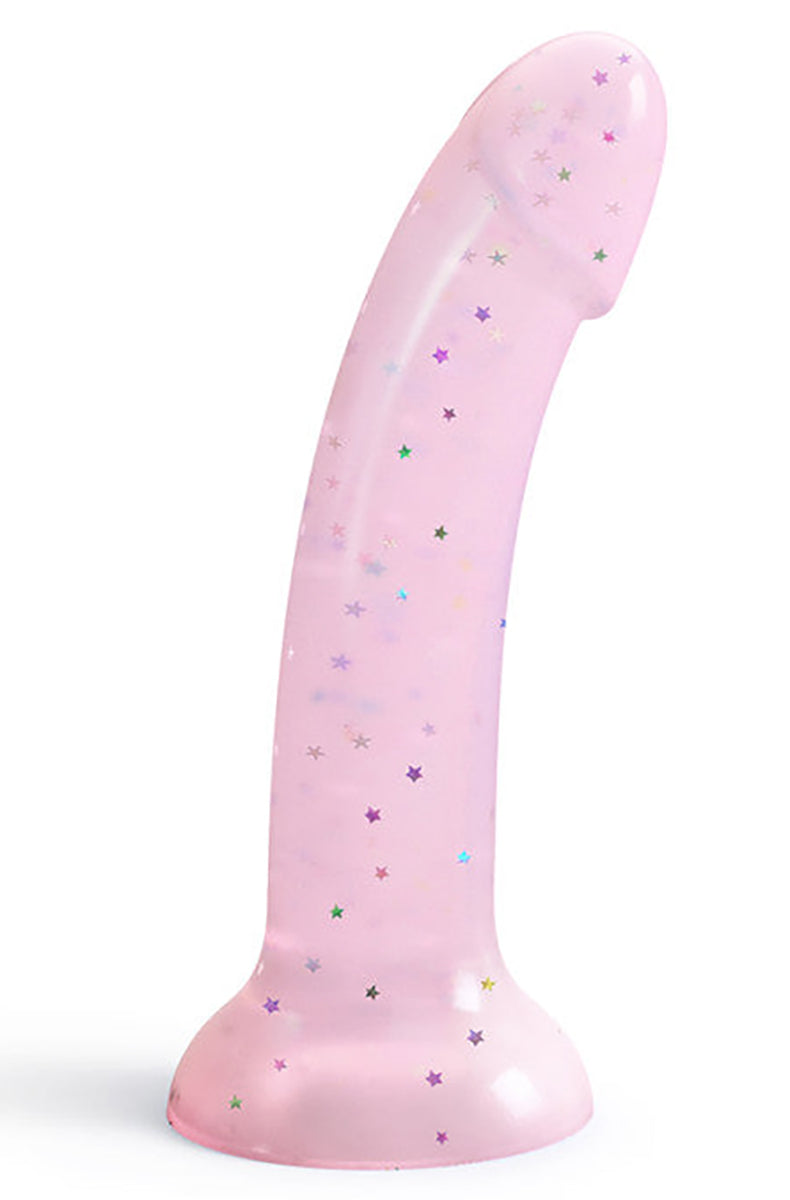 Pastel translucent pink 100% silicone dildo with embedded multicolor holographic stars, curved phallic, flared suction base.