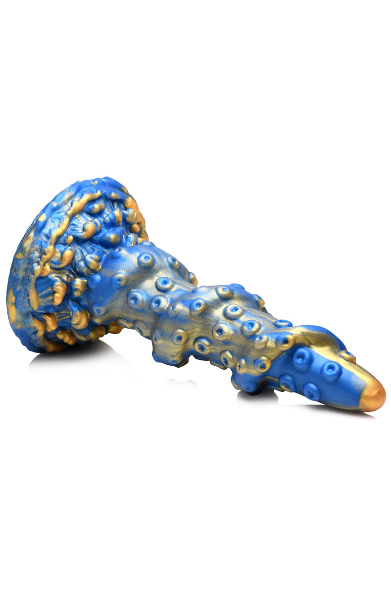 Side view of blue and gold tentacle silicone dildo, spiral suckers wrapping the shaft.