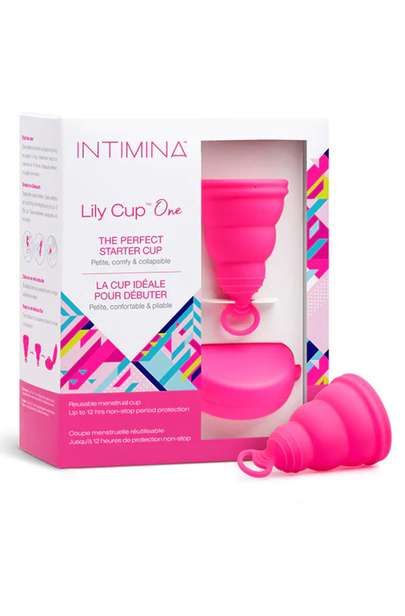 Intimina Lily Cup One pink medical-grade silicone menstrual cup beside its pink Lily Cup One starter box and pink carry case.