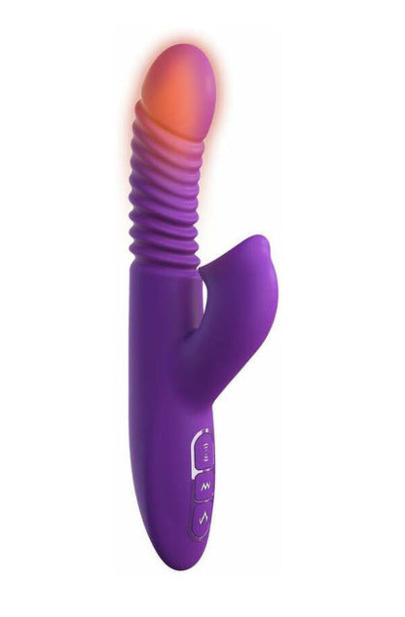 Warming demo showing the heated shaft tip of the Ultimate Thrusting Clit Stimulate-Her glowing warm
