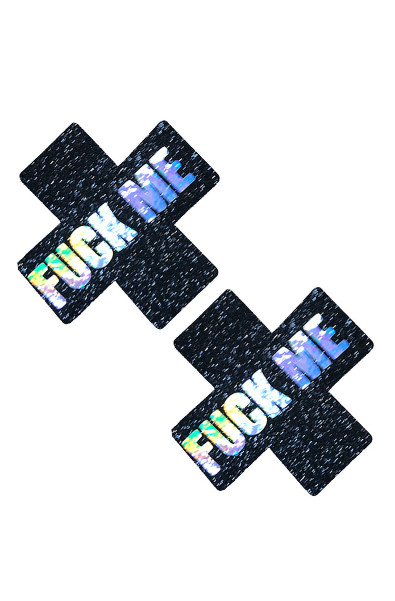 Two black glitter X-shaped pasties with "FUCK ME" printed across the X in oil-slick holographic block lettering.
