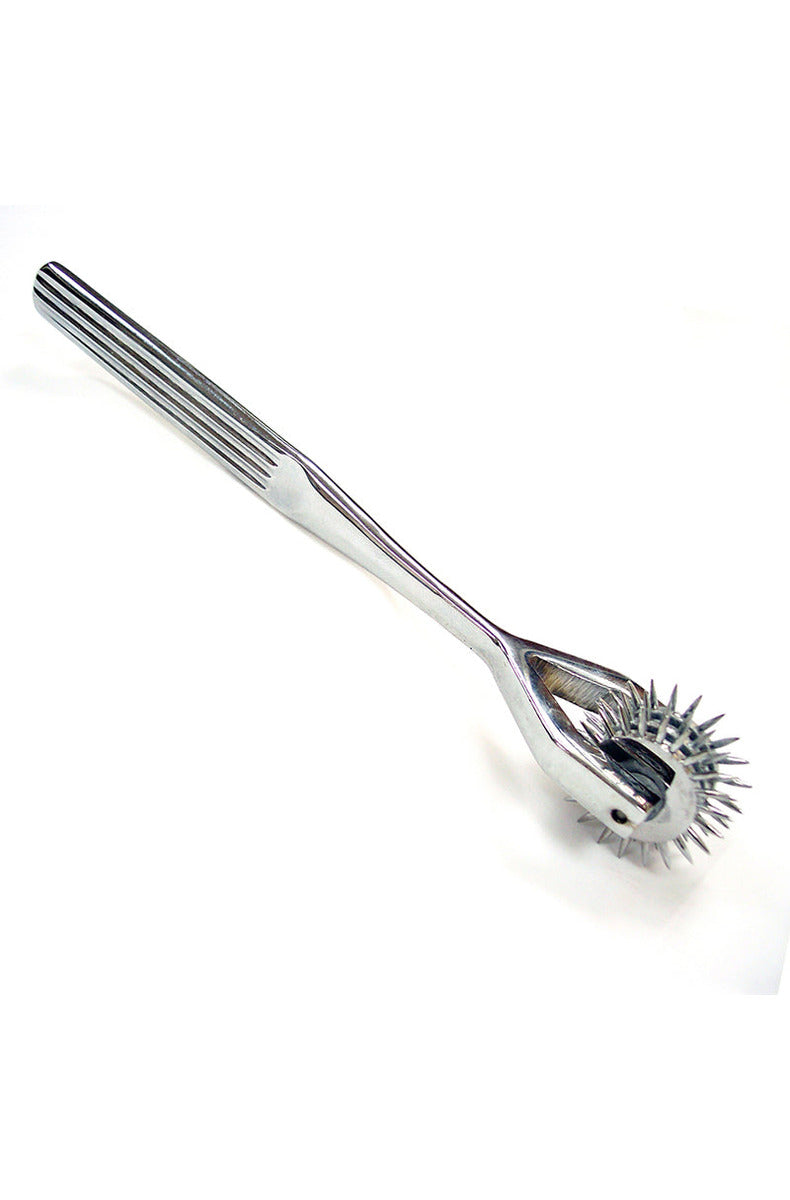 Silver nickel-plated pinwheel with three spinning spiked wheels on a ridged metal handle.
