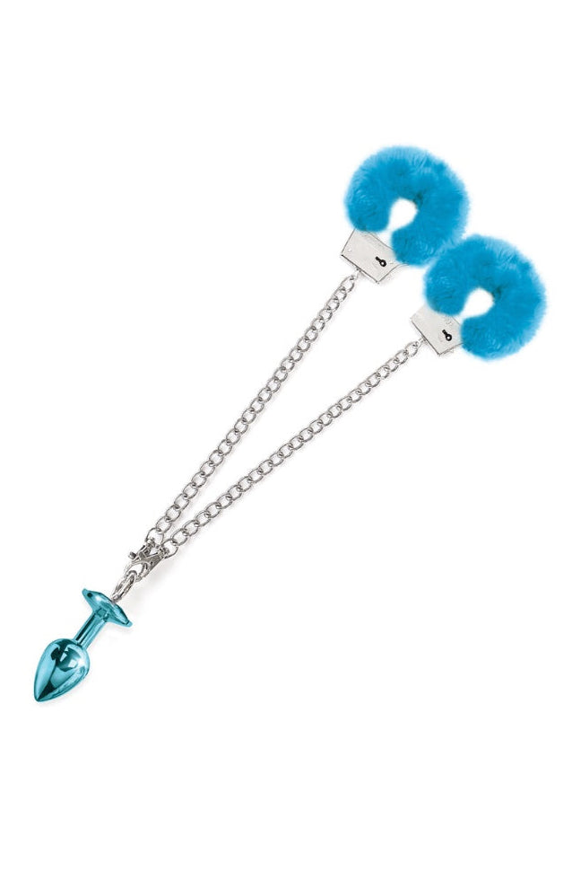 Blue fur-lined handcuffs connected by silver chain to blue metallic butt plug on white background