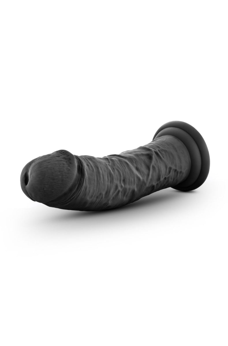 Side view of black curved dildo showing pronounced head and realistic shaft texture