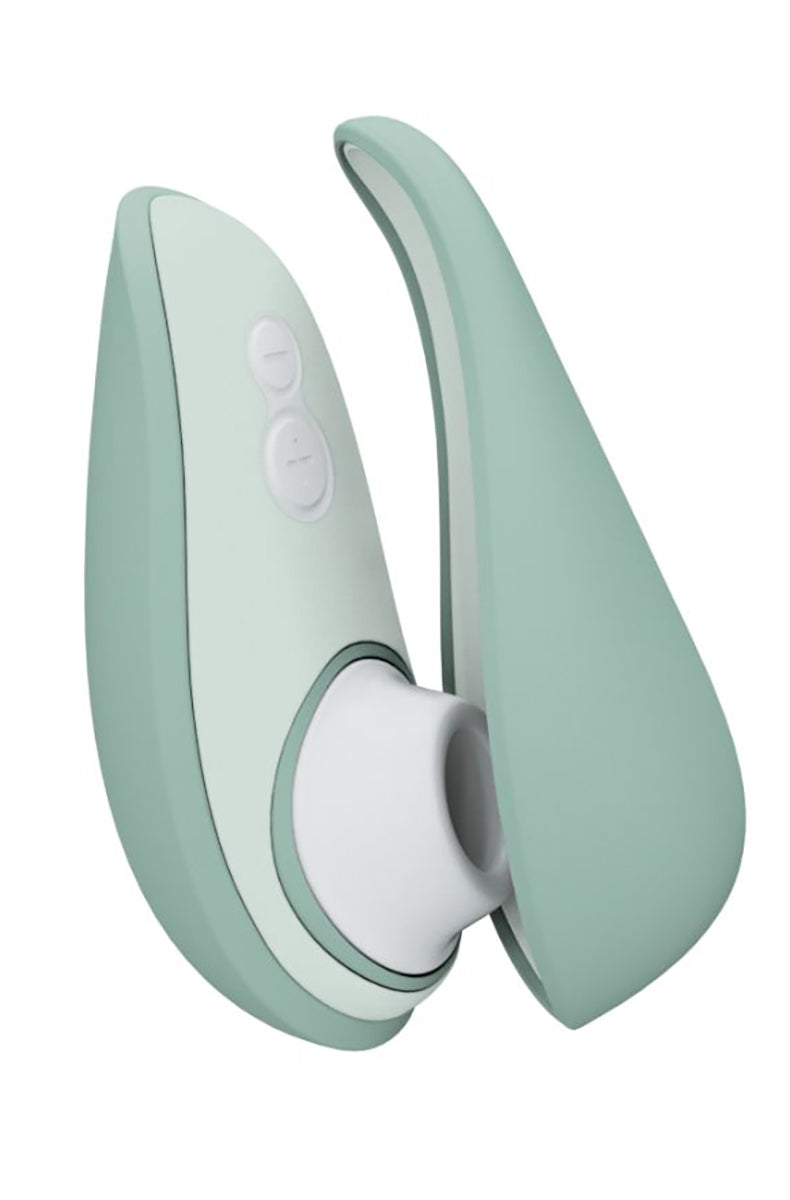 Sage dusty-green Womanizer Liberty 2 air-pulse clitoral toy with two front buttons and white silicone stimulation head.