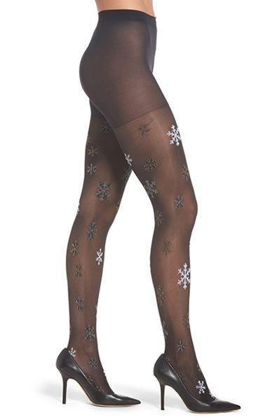 Black sheer tights with silver and gold metallic lurex snowflakes scattered across both legs.