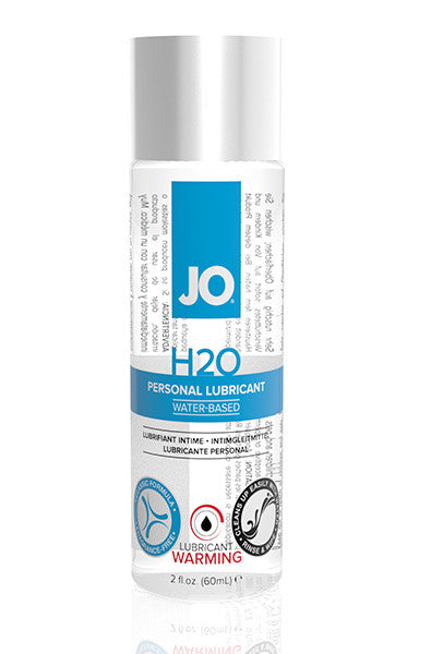 System JO H2O Warming water-based personal lubricant in a clear bottle with blue and white label marked Warming, 2 fl oz.