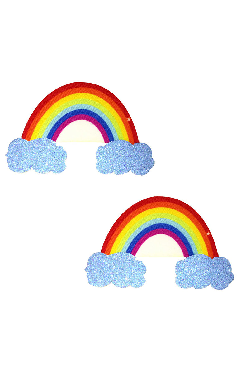 Two rainbow-arch-shaped pasties with bright rainbow stripes and blue glitter clouds at each end.