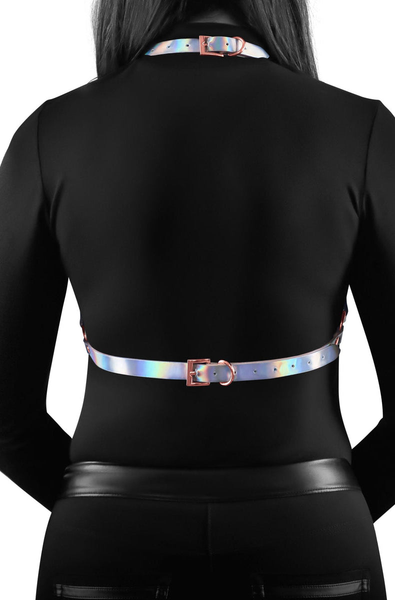 Silver-iridescent holographic vinyl chest harness with high collar, crossover triangle cups, rose-gold rivets, and two chain swags under the bust.