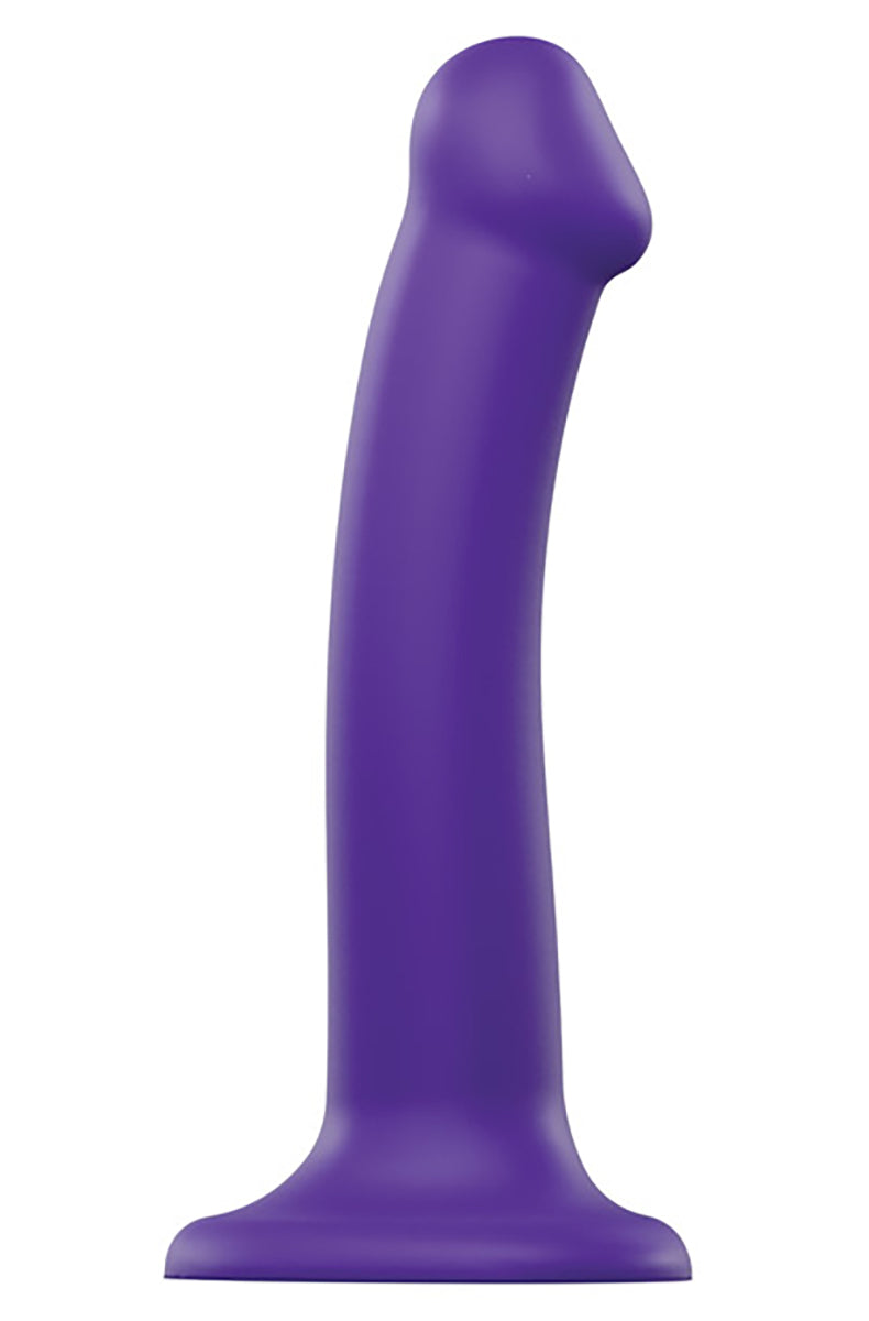 Purple double density silicone bendable dildo by Strap On Me with a curved shaft and flat heart-shaped suction cup base.