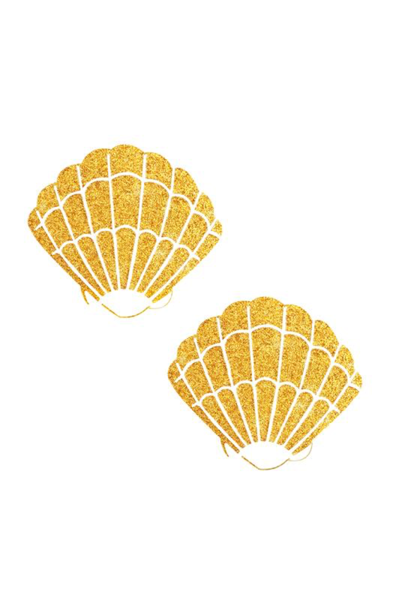 Two scallop-shell-shaped pasties cut from fine gold glitter with cutout shell-rib detail.