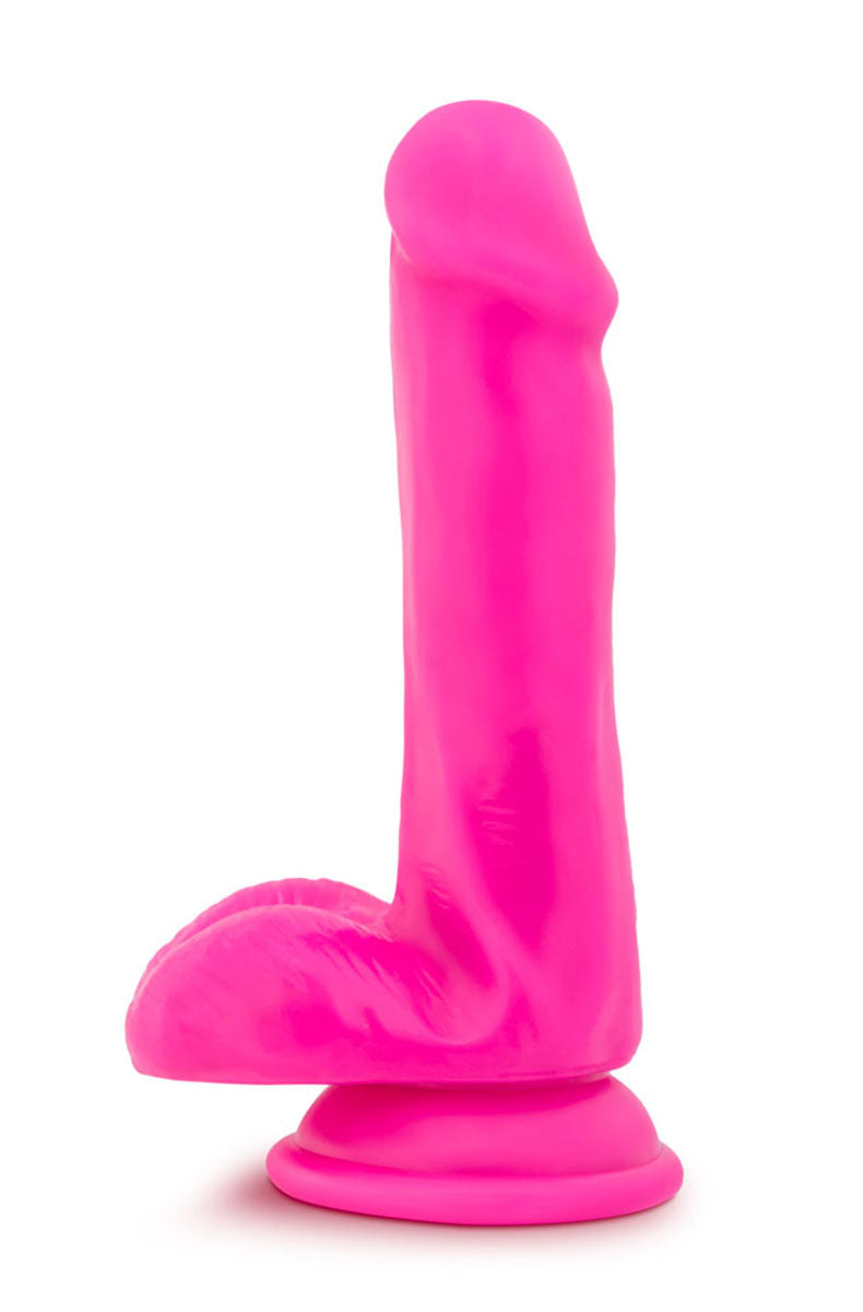 Bright pink realistic dildo with a curved shaft, sculpted veins, flat-set balls at the base, and a round suction cup.