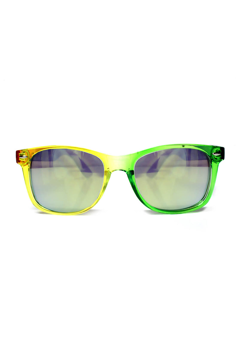 Wayfarer-style sunglasses with transparent rainbow yellow-green-blue frames, GloFX branding on the blue temple, and gold-mirror diffraction lenses.