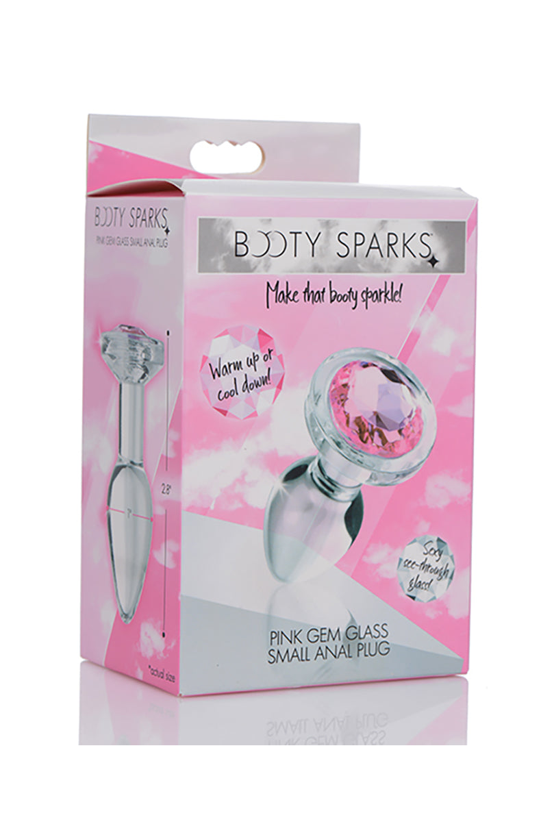Top down view of the small glass butt plug showing the round flared base and the pink gem in the center.