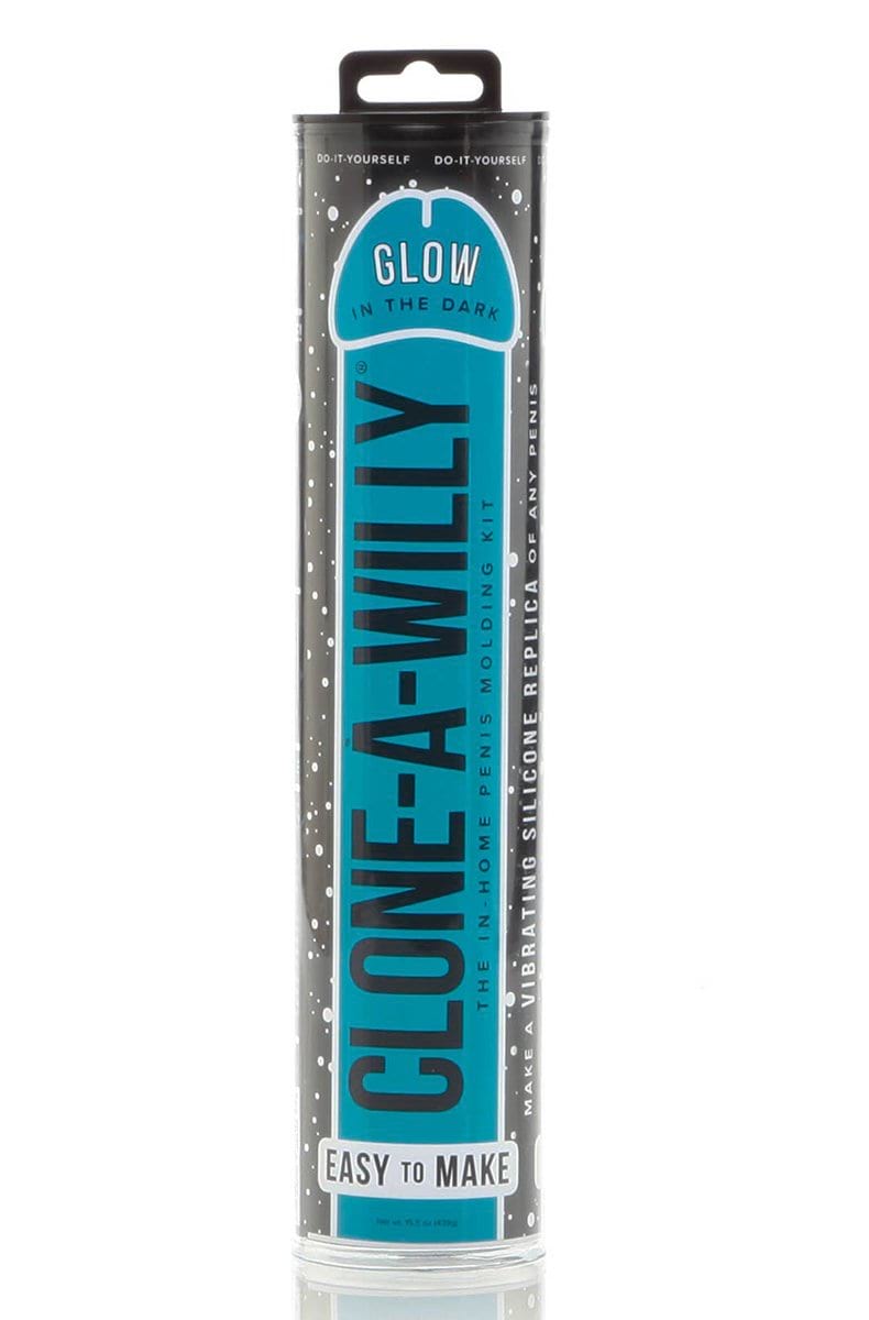 Clone A Willy Glow in the Dark retail tube with teal blue label, white starburst graphics, and a clear plastic display case.