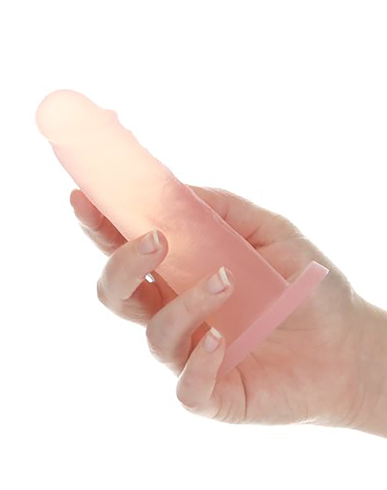 Peach Bellini Cocktails 5.5 in silicone dildo held in hand for scale.