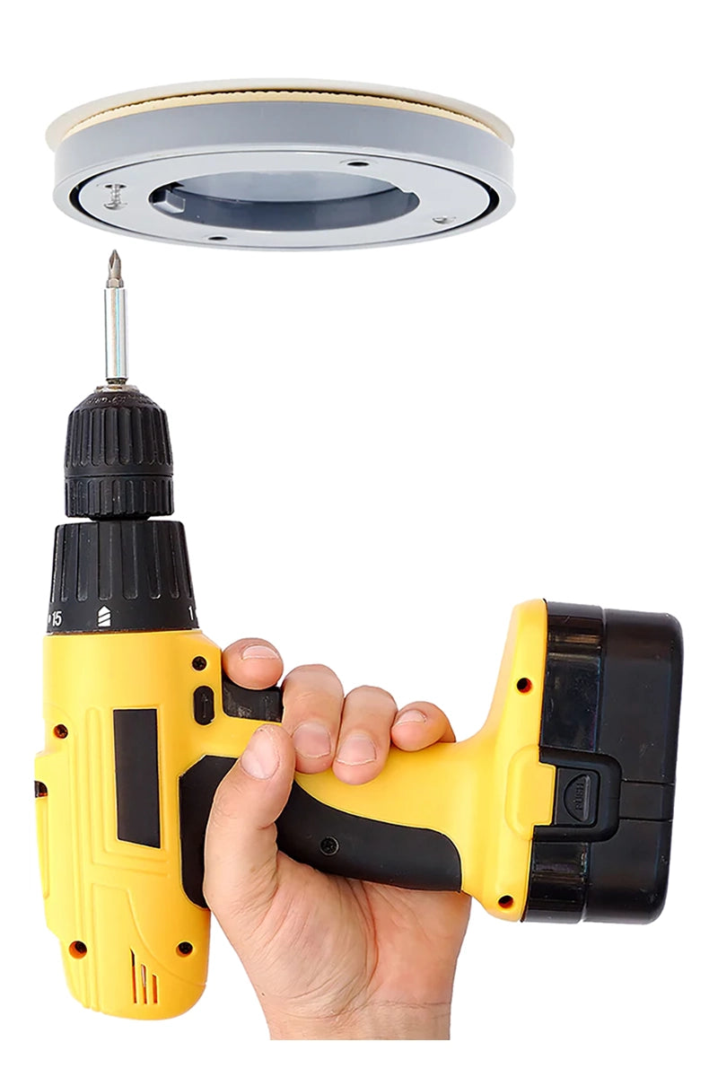 Side view of the Ouch dance pole showing the twist adjustment collar and the ceiling mount disc.