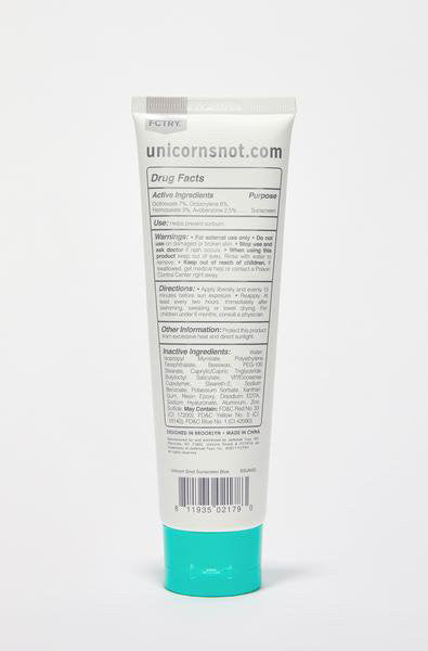Unicorn Snot Blue Glitter Sunscreen SPF 30 tube label closeup showing brand and SPF text.