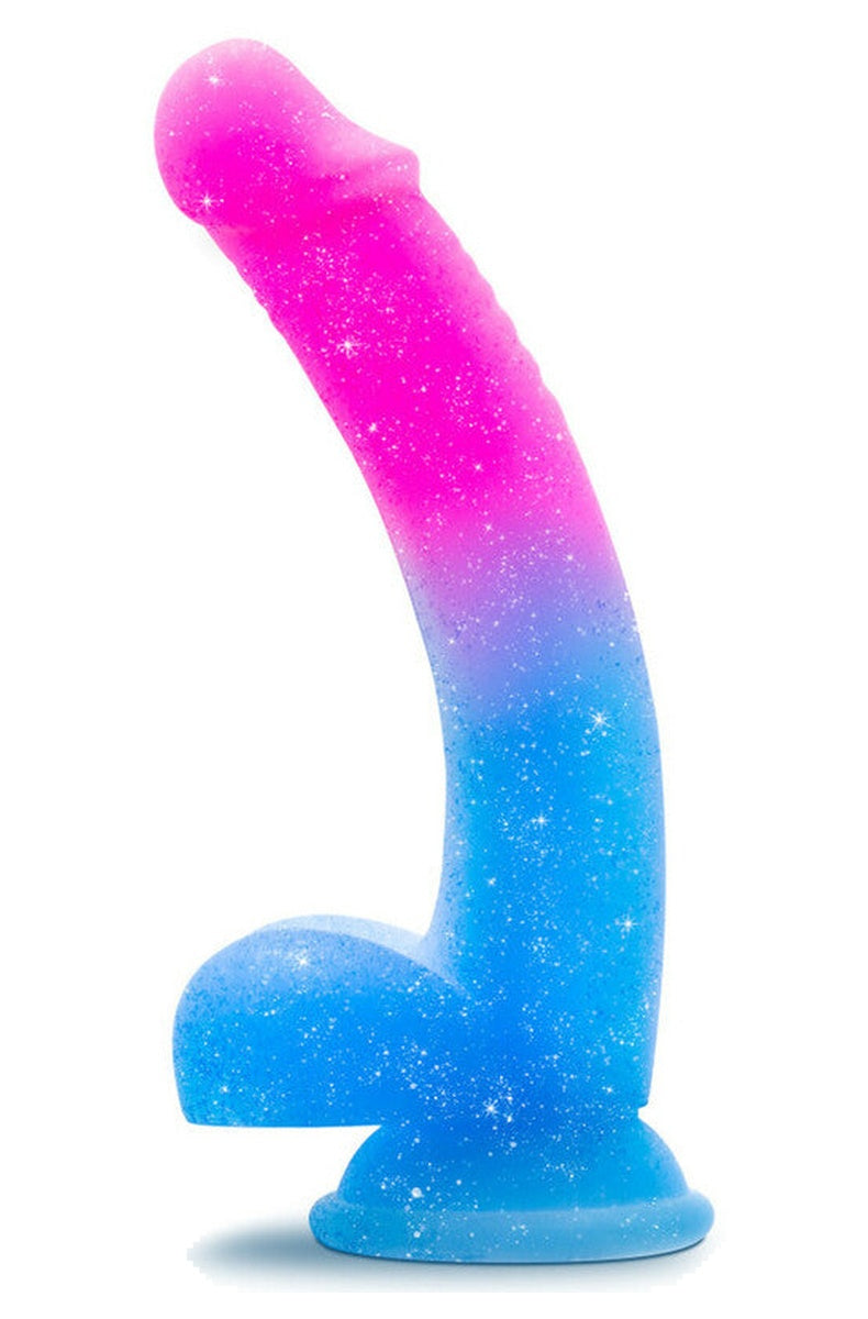 Hot pink to blue glitter dildo with balls, side view showing its curve and suction cup
