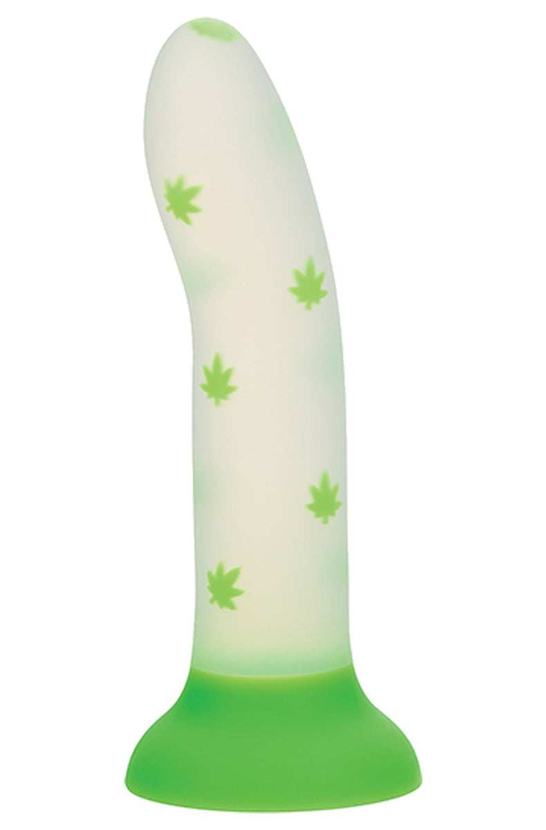 420 pot leaf glow in the dark dildo standing on its green suction cup base