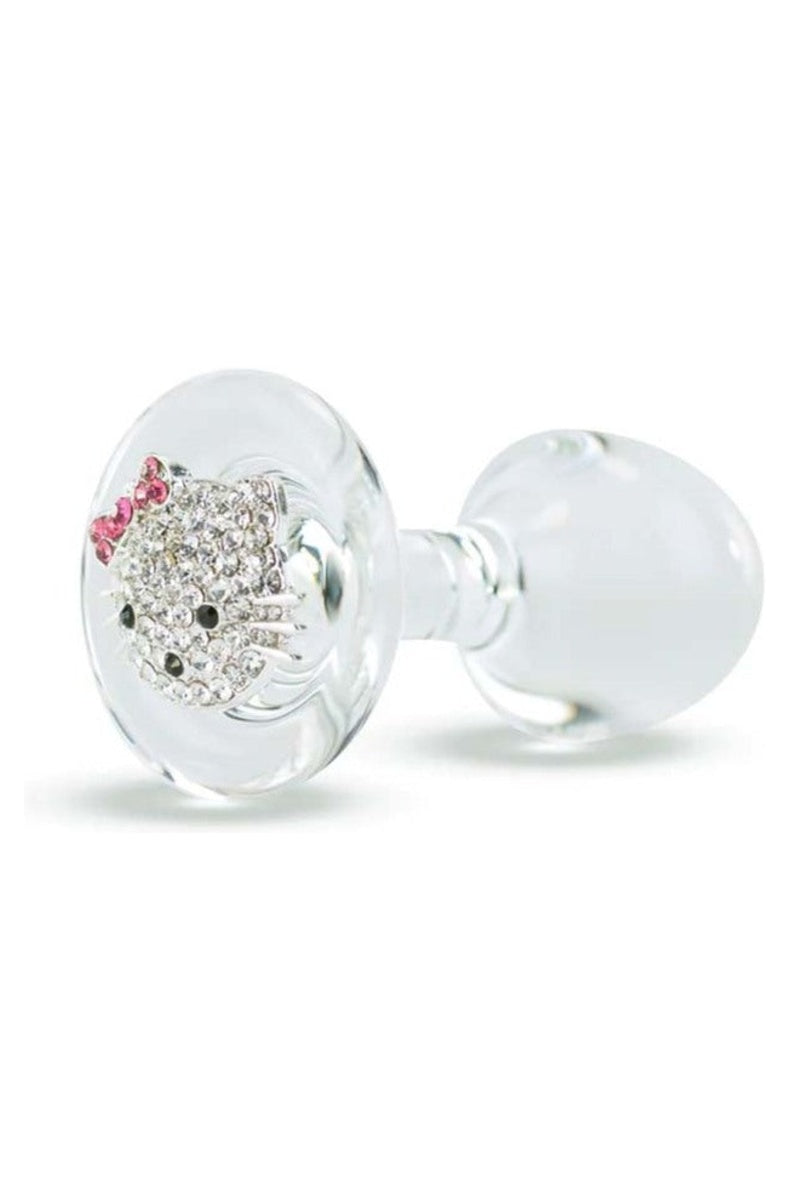 Clear glass butt plug with a crystal set cat face and red bow on the flared base