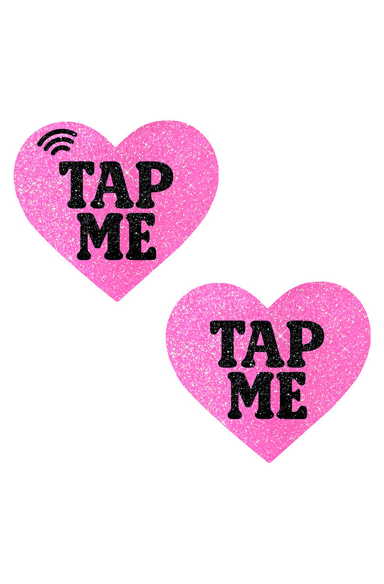 Pair of pink glitter heart pasties reading TAP ME in black, with a printed NFC signal icon