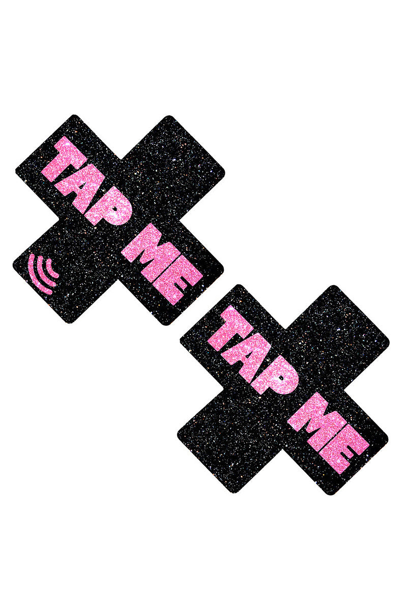Pair of black glitter cross pasties reading TAP ME in pink, with a printed NFC signal icon