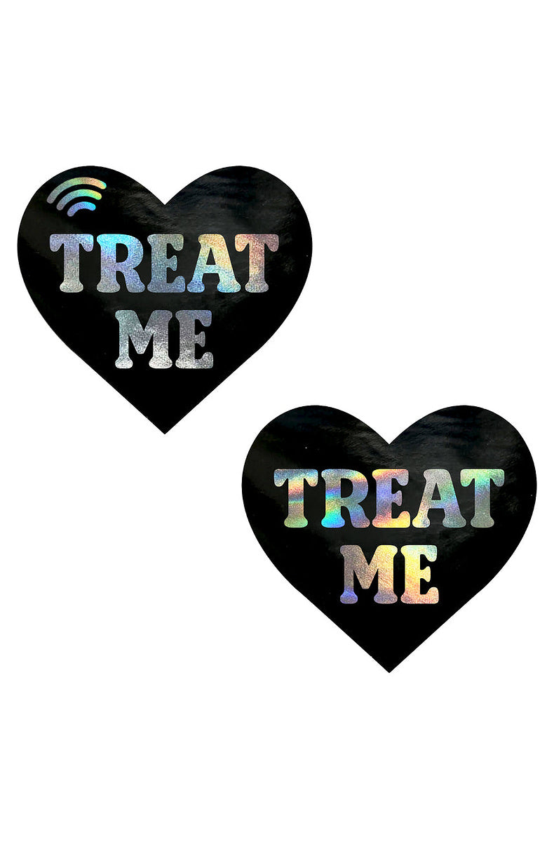 Pair of black heart pasties reading TREAT ME in holographic foil, with a printed NFC signal icon