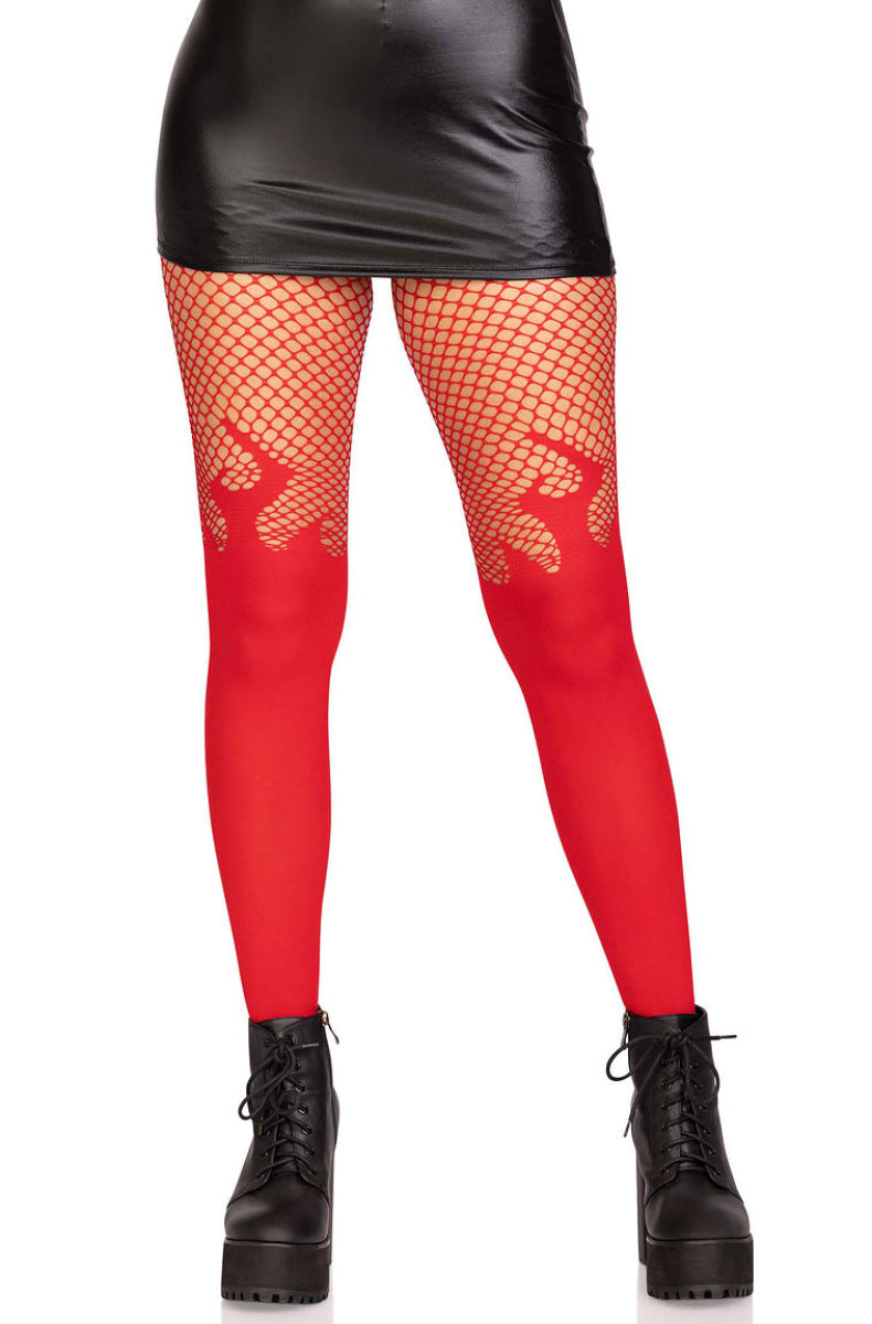 Red opaque tights with a fishnet top and flame detail, worn with a black mini skirt and boots