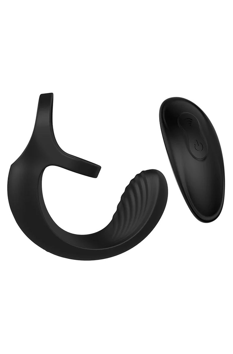 Ball Cradle cock ring and remote laid flat, showing the two remote buttons