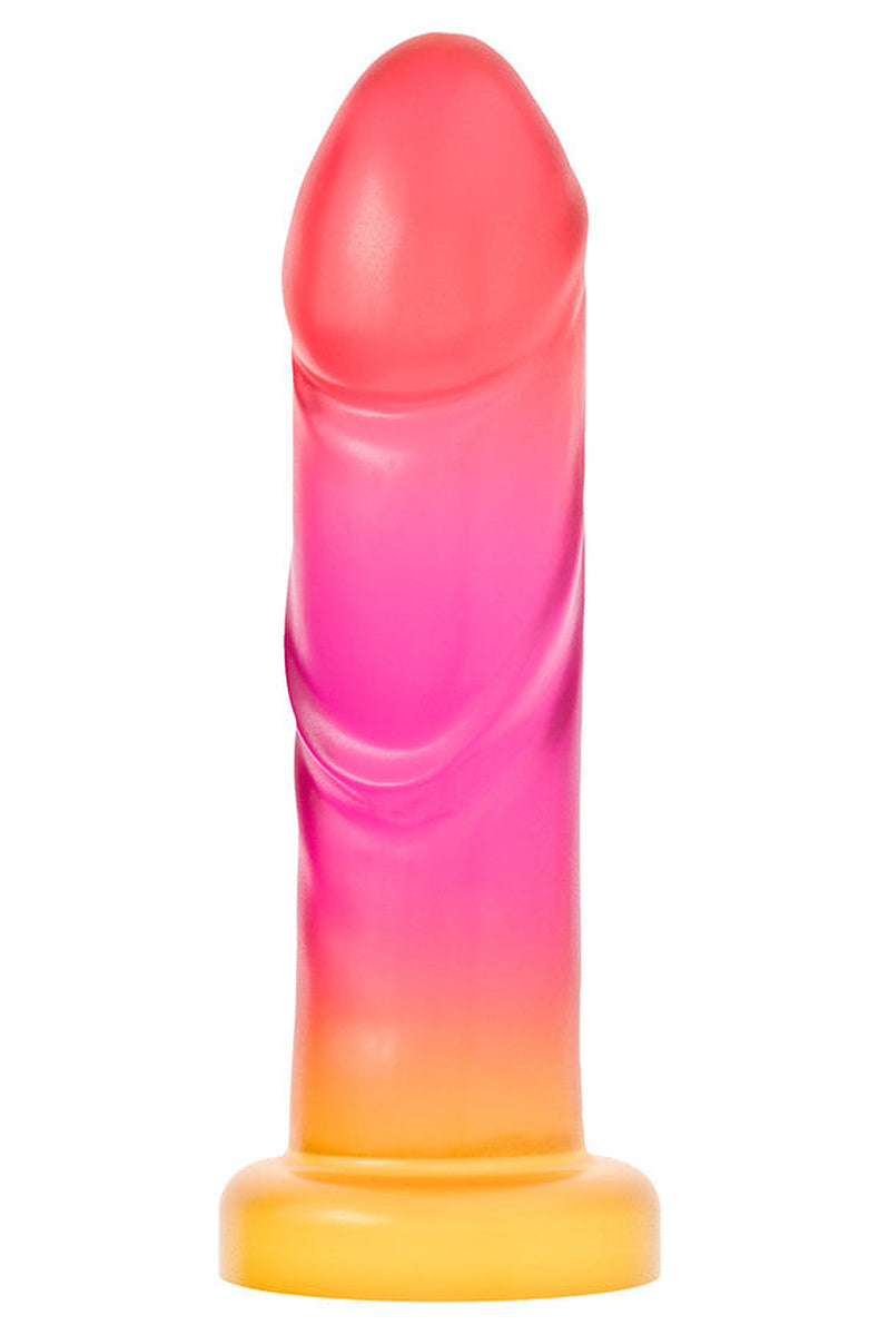 Coral to gold ombre dildo turned slightly to show its veining