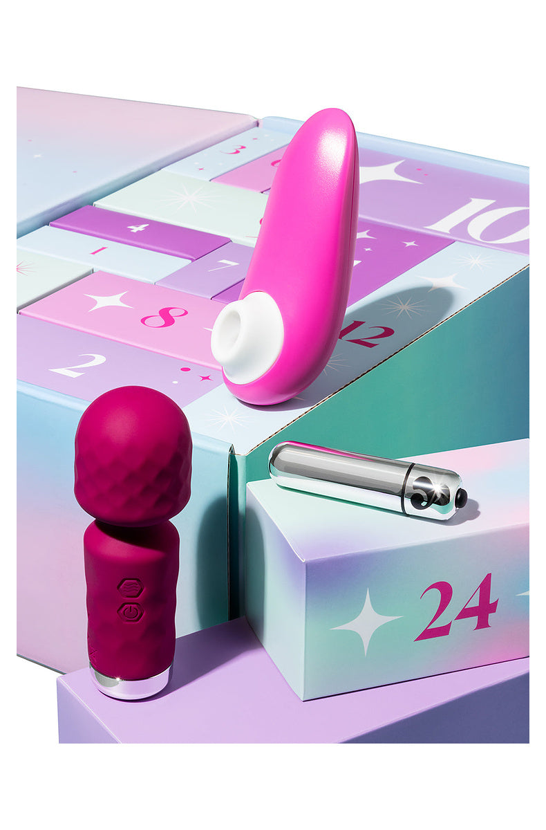Pink Womanizer Starlet 3, berry mini wand and silver bullet vibrator on the advent calendar doors