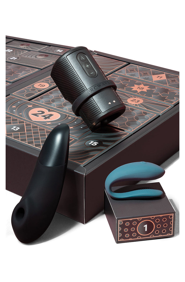 Black Womanizer Enhance, teal We-Vibe Sync Lite and Arcwave Zing on the calendar doors