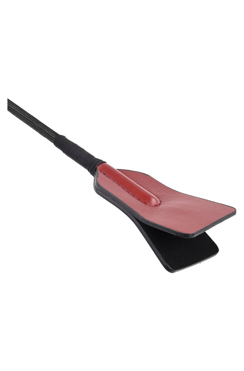Close view of the red silicone flogger falls on the dual ended crop