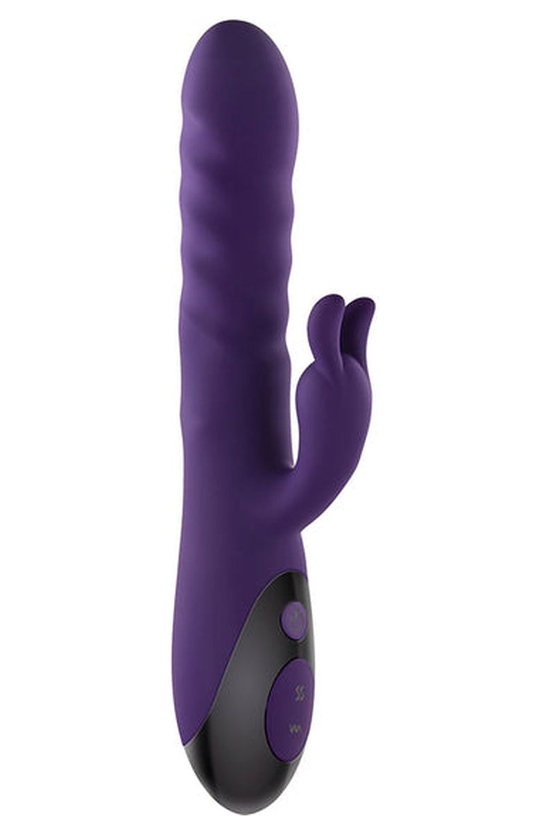 Side view of the purple Rascally Rabbit thrusting vibrator, spiral ribbing running the length of the shaft.