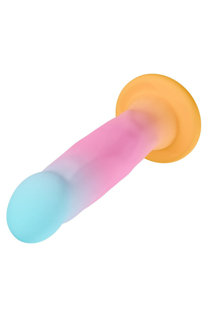 Gold suction cup base of the aqua and pink ombre dildo