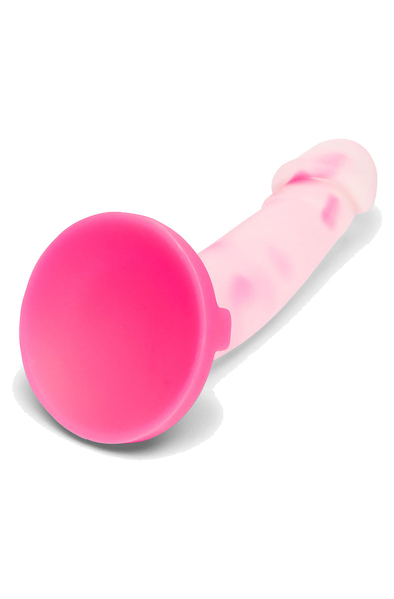 Pink suction cup base of the clear silicone heart dildo