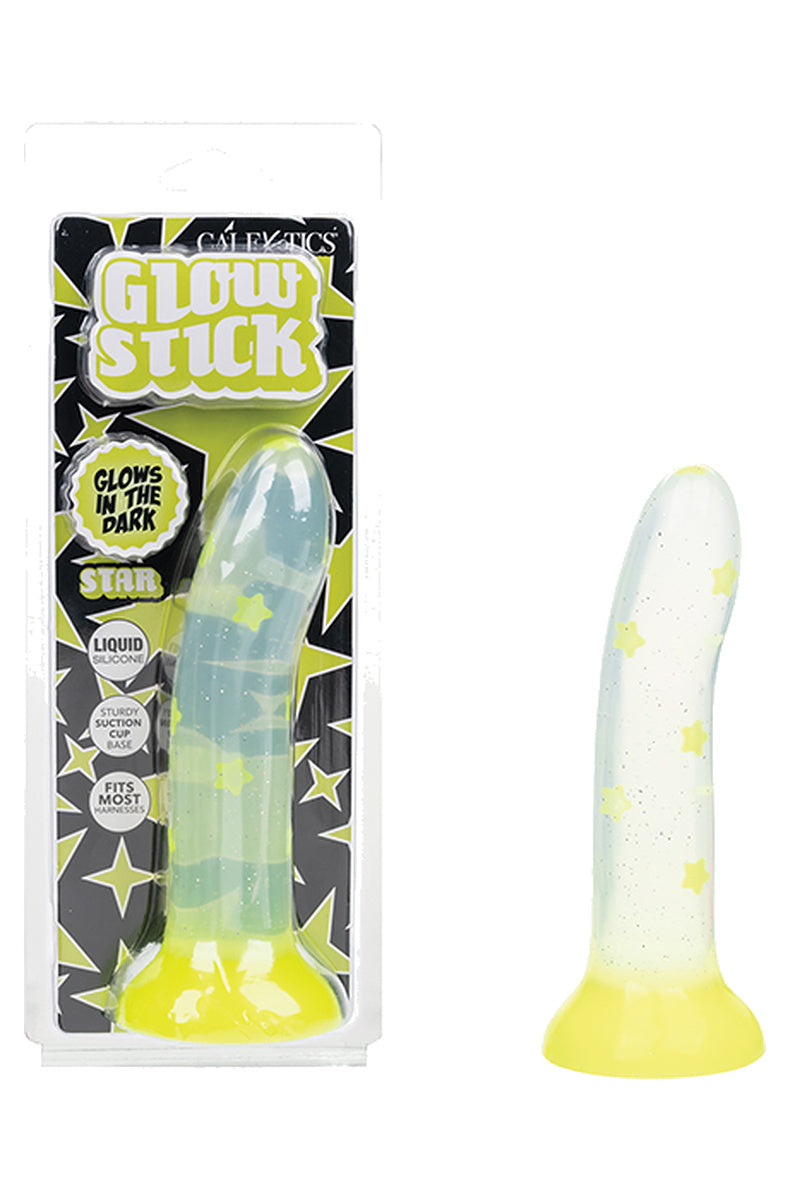 Yellow star glow in the dark dildo next to its retail box