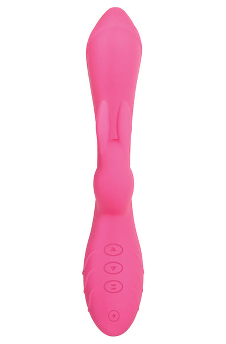 Back of the pink Bunny Kisses rabbit vibrator, four control buttons and wave textured grip on the handle.