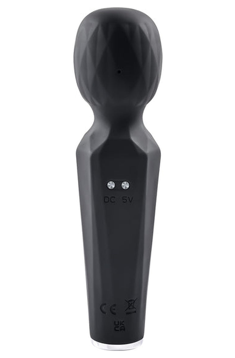 Back of the black Rainbow Sucker wand showing the two magnetic charging contacts marked DC 5V.