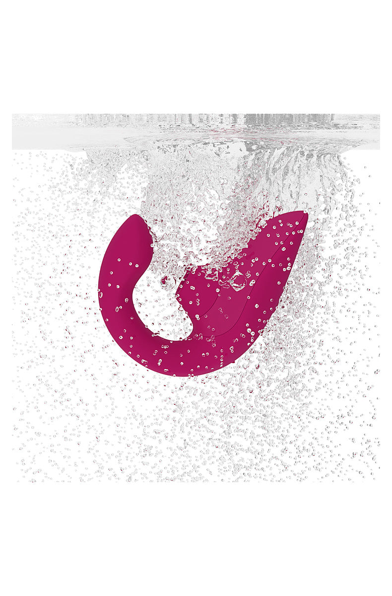 Vibrant Pink Blend in a splash of water, showing the IPX7 waterproof body.