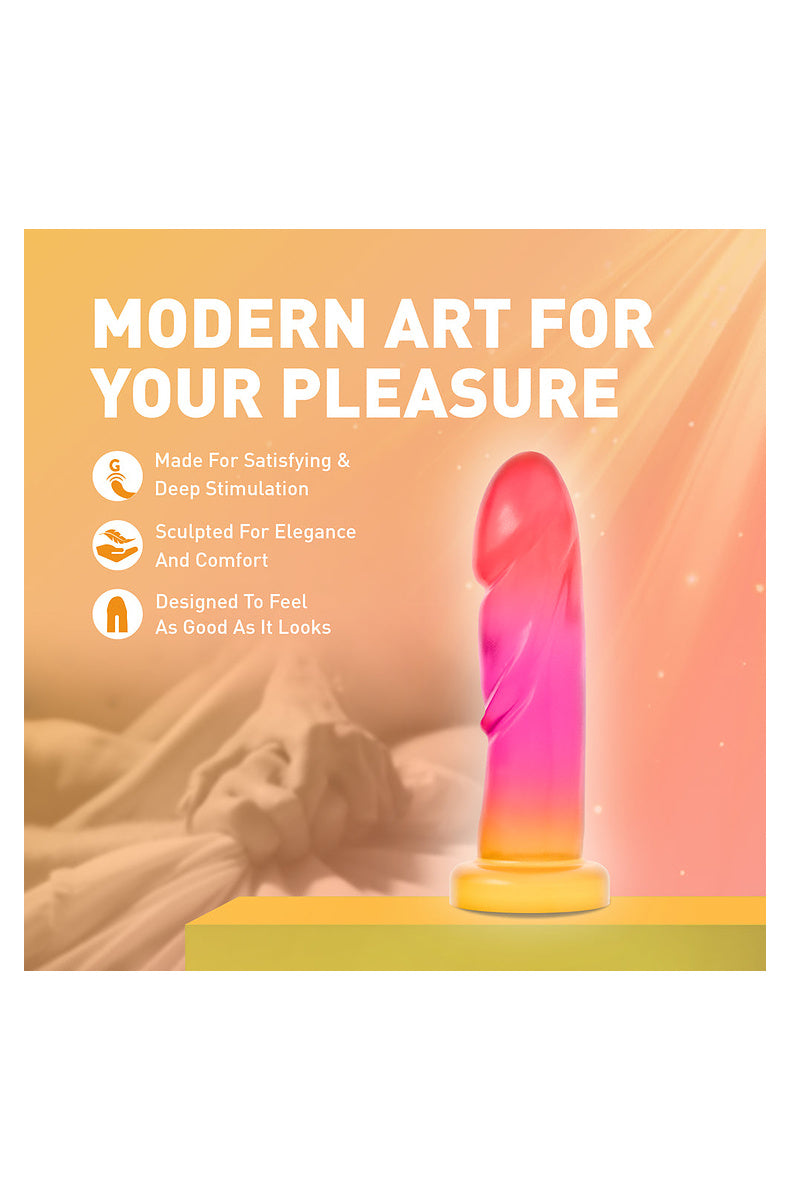 Pink and gold ombre dildo on a bed: made for satisfying deep stimulation, sculpted for elegance and comfort